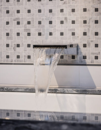 wide, flat, modern water faucet