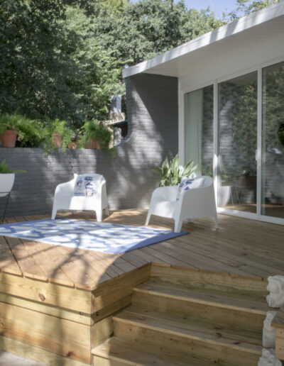 wood deck with lounge seating and stair steps