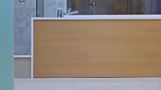 yellow wood panel on tub