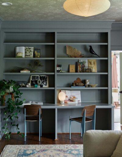 built-in gray shelving and desks