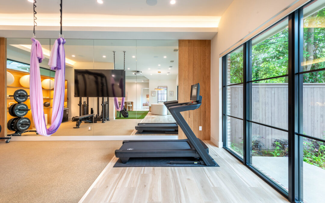 RJA Construction home gym renovation with treadmill, aerial yoga silks, and large windows in Dallas,