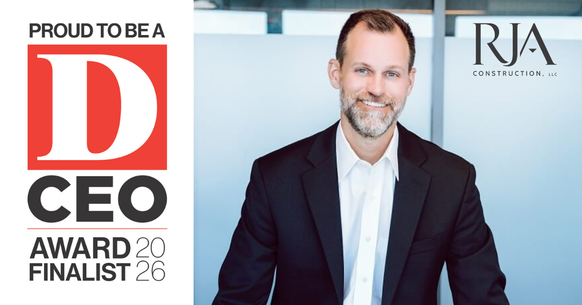 A man in a suit smiles at the camera. Next to him is a graphic: Proud to be a D CEO Award 2026 Finalist. The RJA Construction, LLC logo appears in the top right corner.
